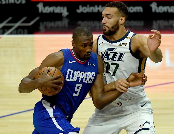 Rudy Gobert (27) guards Serge Ibaka (9) as Ibaka drives into the paint